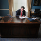 Virginia Gov. Glenn Youngkin works at his desk inside his private office at the State Capitol in Richmond, Va., Jan. 18, 2022.